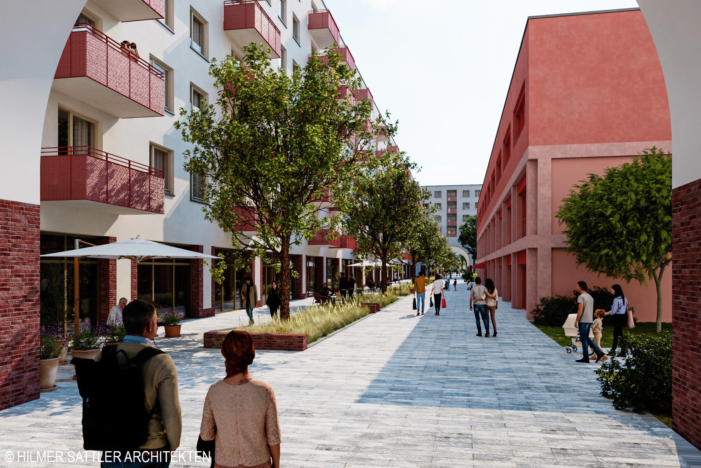 Runder Eingang zum Innenhof mit Blick auf Fassade und Weg