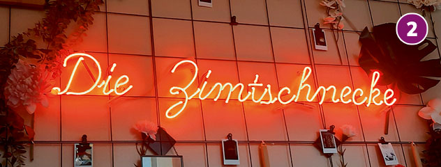Eingangsschild des Cafés Zimtschnecke